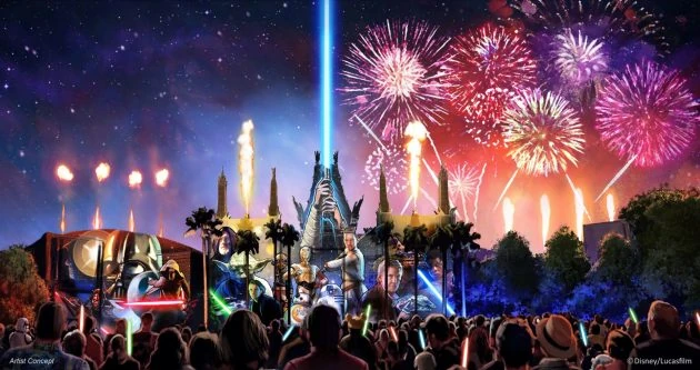 Castillo de parque temático iluminado con fuegos artificiales y luces púrpuras