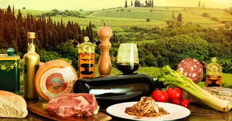 Productos de Toscana: vino, queso, carne y vegetales con paisaje de viñedos