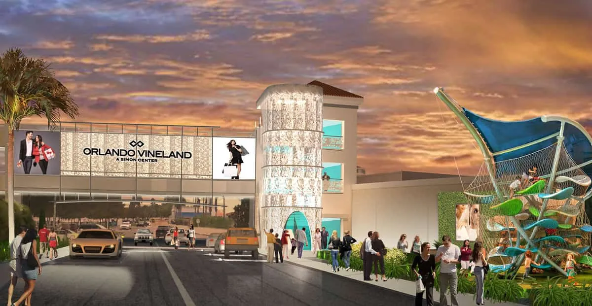 Entrada principal de Orlando Vineland Premium Outlets al atardecer, centro de compras en Florida.