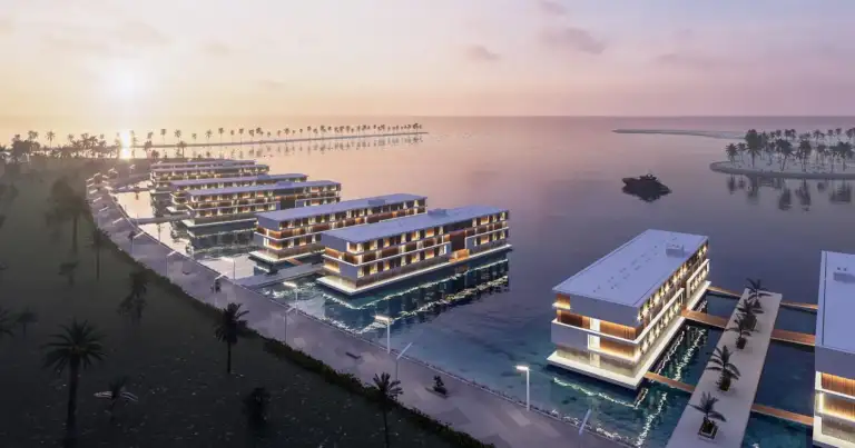 Edificios residenciales modernos reflejados en el agua
