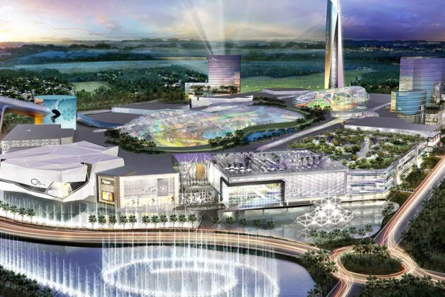Proyecto arquitectónico de American Dream Miami con torre central, edificios y espacios verdes