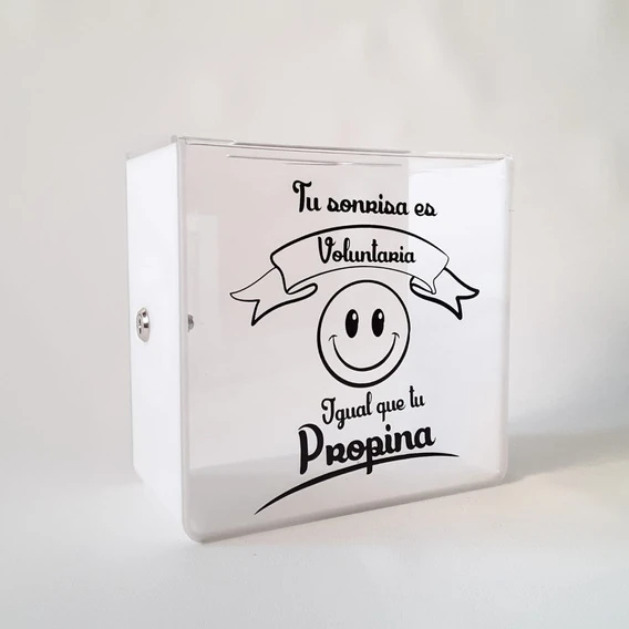 Caja para propinas con frase sobre que la propina es voluntaria