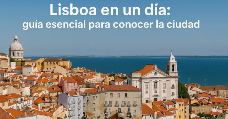 Panorama del barrio de Alfama en Lisboa con casas de techos rojos y el río Tajo al fondo en un día despejado.
